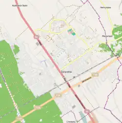 Mapa konturowa Żyrardowa, w centrum znajduje się punkt z opisem „Parafia św. Karola Boromeusza”