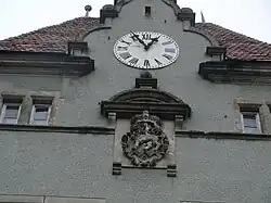 Herb z fasady pałacu