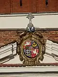 Herb Ostrogskich-Zasławskich nad bramą