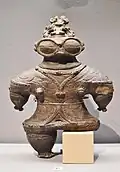 Figurka Dogū znaleziona na stanowisku archeologicznym w Kamegaoka (obecnie część Tsugaru). Końcowy okres Jōmon, 1000–400 p.n.e. Ważny zabytek kultury Japonii. Muzeum Narodowe w Tokio