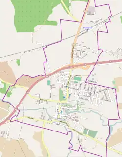 Mapa konturowa Barczewa, blisko centrum na dole znajduje się ikonka zamku z wieżą z opisem „Zamek w Barczewie”