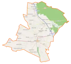 Mapa konturowa gminy Brześć Kujawski, blisko centrum na prawo znajduje się punkt z opisem „Pikutkowo”