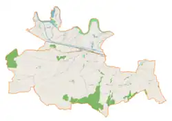 Mapa konturowa gminy Brzeźnica, blisko centrum na dole znajduje się punkt z opisem „Kościół św. Marcina w Marcyporębie”