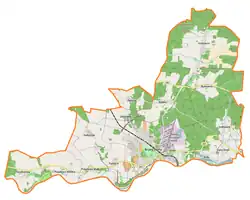 Mapa konturowa gminy Brzeg Dolny, blisko centrum na prawo znajduje się punkt z opisem „Radecz”