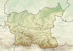 Mapa konturowa obwodu Łowecz, blisko dolnej krawiędzi nieco na prawo znajduje się czarny trójkącik z opisem „Lewski, Ambarica”