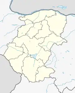 Mapa konturowa obwodu Montana, u góry znajduje się punkt z opisem „Łom”