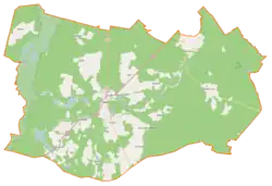 Mapa konturowa gminy Człopa, w centrum znajduje się punkt z opisem „Bagno Raczyk”