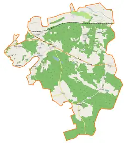 Mapa konturowa gminy Dąbie, na dole po prawej znajduje się punkt z opisem „źródło”, natomiast blisko centrum na lewo u góry znajduje się punkt z opisem „ujście”