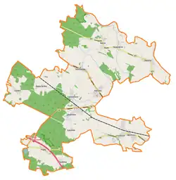 Mapa konturowa gminy Dąbrowa, blisko górnej krawiędzi znajduje się punkt z opisem „Narok”