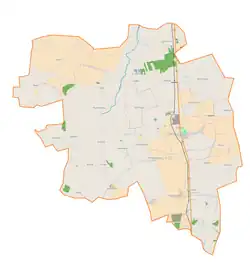 Mapa konturowa gminy Daszyna, blisko centrum na dole znajduje się punkt z opisem „Siedlew”