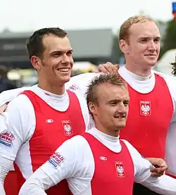 D. Pacześ, Ł. Kardas na podium MŚ 2007 (ze sternikiem Trojanowskim)