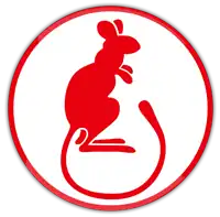 Plakietka z czerwoną sylwetką podskoczka