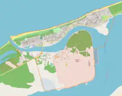 Mapa konturowa Dziwnowa, w centrum znajduje się punkt z opisem „Parafia wojskowaMatki Bożej Różańcowej”