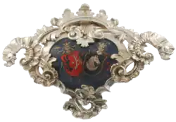 Kartusz epitafijny z herbami Działosza i Alabanda