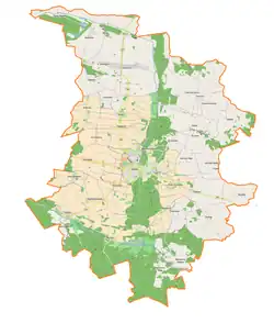 Mapa konturowa gminy Góra, blisko centrum na prawo znajduje się punkt z opisem „Kruszyniec”