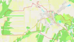 Mapa konturowa Głowaczowa, blisko centrum na prawo u góry znajduje się punkt z opisem „KościółŚwiętego Wawrzyńca”