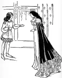 Ilustracja przedstawia dwie osoby. Po lewej stronie długowłosy chłopiec w tunice mówi coś, gestykulując. Naprzeciwko niego, po prawej stronie ilustracji, stoi kobieta o długich, czarnych włosach, w koronie na głowie i długiej sukni z peleryną.