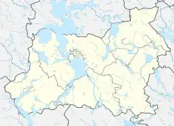 Mapa konturowa powiatu giżyckiego, blisko centrum u góry znajduje się punkt z opisem „Perkuny”