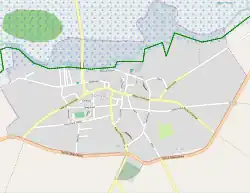 Mapa konturowa Goniądza, po lewej nieco na dole znajduje się punkt z opisem „Guzy”