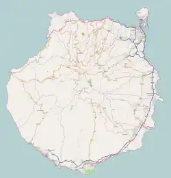 Mapa konturowa Gran Canarii, blisko dolnej krawiędzi znajduje się punkt z opisem „Maspalomas”
