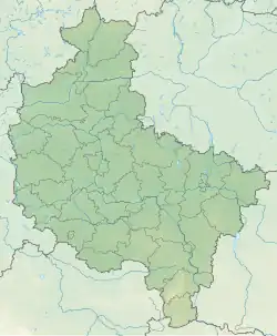 Mapa konturowa województwa wielkopolskiego, blisko centrum na lewo znajduje się punkt z opisem „Meteoryt Morasko”