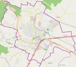 Mapa konturowa Grodziska Wielkopolskiego, blisko centrum na lewo u góry znajduje się punkt z opisem „Parafia pod wezwaniem św. Faustyny”