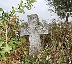 Krzyż bruśnieński na cmentarzu przycerkiewnym