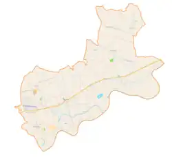 Mapa konturowa gminy Igołomia-Wawrzeńczyce, po prawej znajduje się punkt z opisem „Parafia Świętej Marii Magdaleny”