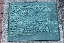 Tablica z informacją dotycząca historii powstania pomnika