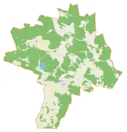 Mapa konturowa gminy Janowo, po lewej nieco u góry znajduje się punkt z opisem „Muszaki”