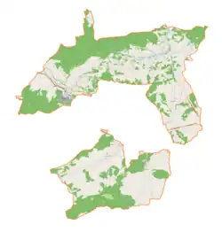 Mapa konturowa gminy wiejskiej Jordanów, blisko centrum u góry znajduje się punkt z opisem „źródło”, natomiast u góry po prawej znajduje się punkt z opisem „ujście”
