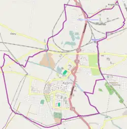 Mapa konturowa Kępna, na dole znajduje się punkt z opisem „Parafia Wszystkich Świętych”