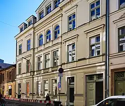 Kraków, ul. Krupnicza 8.Kamienica (1873–1874, wspólnie z Teofilem Żebrawskim i Tomaszem Prylińskim).