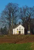 Murowana kaplica, w której od 1910r. do 2008r. mieścił się obraz Matki Bożej Pocieszenia