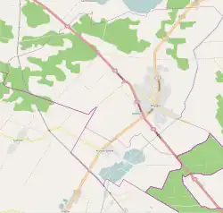 Mapa konturowa Knyszyna, po prawej nieco u góry znajduje się punkt z opisem „Budynek szpitalny w Knyszynie”