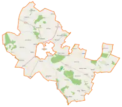 Mapa konturowa gminy wiejskiej Kościan, blisko centrum na dole znajduje się punkt z opisem „Racot”
