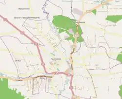 Mapa konturowa Krasnegostawu, blisko centrum na dole znajduje się punkt z opisem „Muzeum Regionalne w Krasnymstawie”