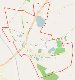 Mapa konturowa Krzywinia, po lewej znajduje się punkt z opisem „Parafia św. Mikołaja Biskupa”