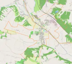 Mapa konturowa Kunowa, w centrum znajduje się punkt z opisem „Parafia św. Władysława”
