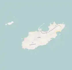 Mapa konturowa Alderney, po lewej nieco u góry znajduje się punkt z opisem „Burhou”