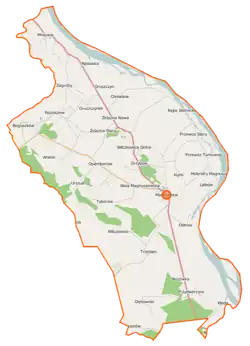 Mapa konturowa gminy Magnuszew, blisko centrum na prawo znajduje się punkt z opisem „Magnuszew”