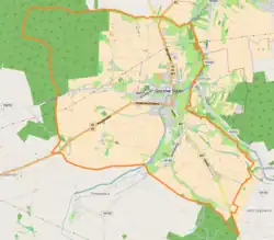 Mapa konturowa Gorzowa Śląskiego, blisko centrum na prawo u góry znajduje się punkt z opisem „Parafia Trójcy Świętej w Gorzowie Śląskim”