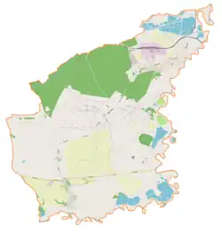 Mapa konturowa gminy Miedźna, blisko centrum po prawej na dole znajduje się punkt z opisem „Parafia św. Barbary”