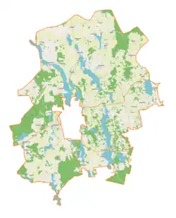 Mapa konturowa gminy wiejskiej Mrągowo, na dole nieco na prawo znajduje się owalna plamka nieco zaostrzona i wystająca na lewo w swoim dolnym rogu z opisem „Jezioro Probarskie”