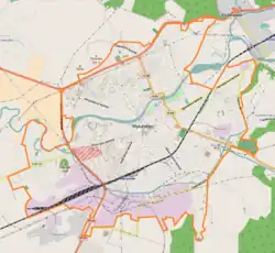 Mapa konturowa Mukaczewa, po lewej nieco na dole znajduje się ikonka zamku z wieżą z opisem „Zamek Palanka”