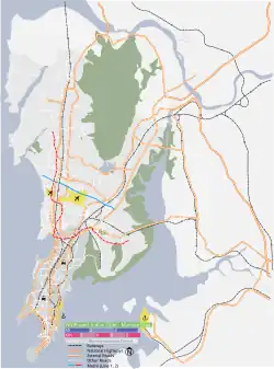 Mapa konturowa Mumbaju, blisko dolnej krawiędzi po lewej znajduje się punkt