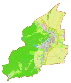 Mapa konturowa gminy Mengeš, blisko centrum na prawo znajduje się punkt z opisem „Mengeš”
