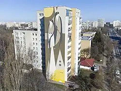 Mural Jaskółki autorstwa Igora Chołdy (Aqualoopy) znajdujący się na bloku przy ul. Nutki 1