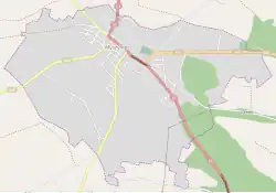 Mapa konturowa Myszyńca, u góry znajduje się punkt z opisem „Cmentarz rzymskokatolicki w Myszyńcu”