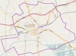 Mapa konturowa Nakła nad Notecią, blisko centrum na dole znajduje się punkt z opisem „Parafia św. Wawrzyńca”